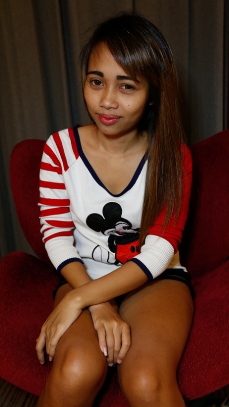 Pretty Asian babe Koi shows her creampied hairy pussy after hardcore sex