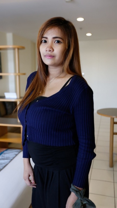 Stacked Asian babe Dear B shows off her big tits & her hairy pussy before sex