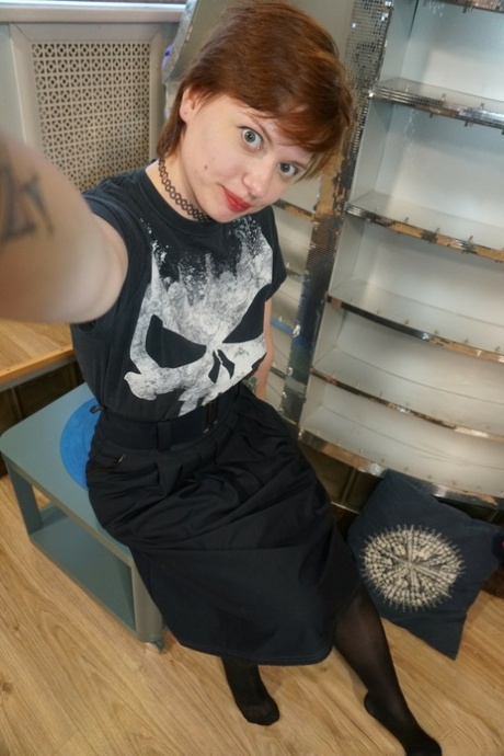 Short haired amateur Selena Sky exposes her small tits and hot ass in a solo