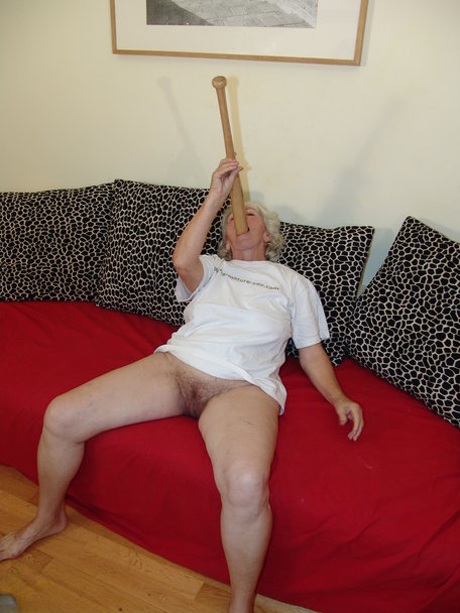 Slutty granny Maria pisses on a bucket before toying her warm twat with a bat